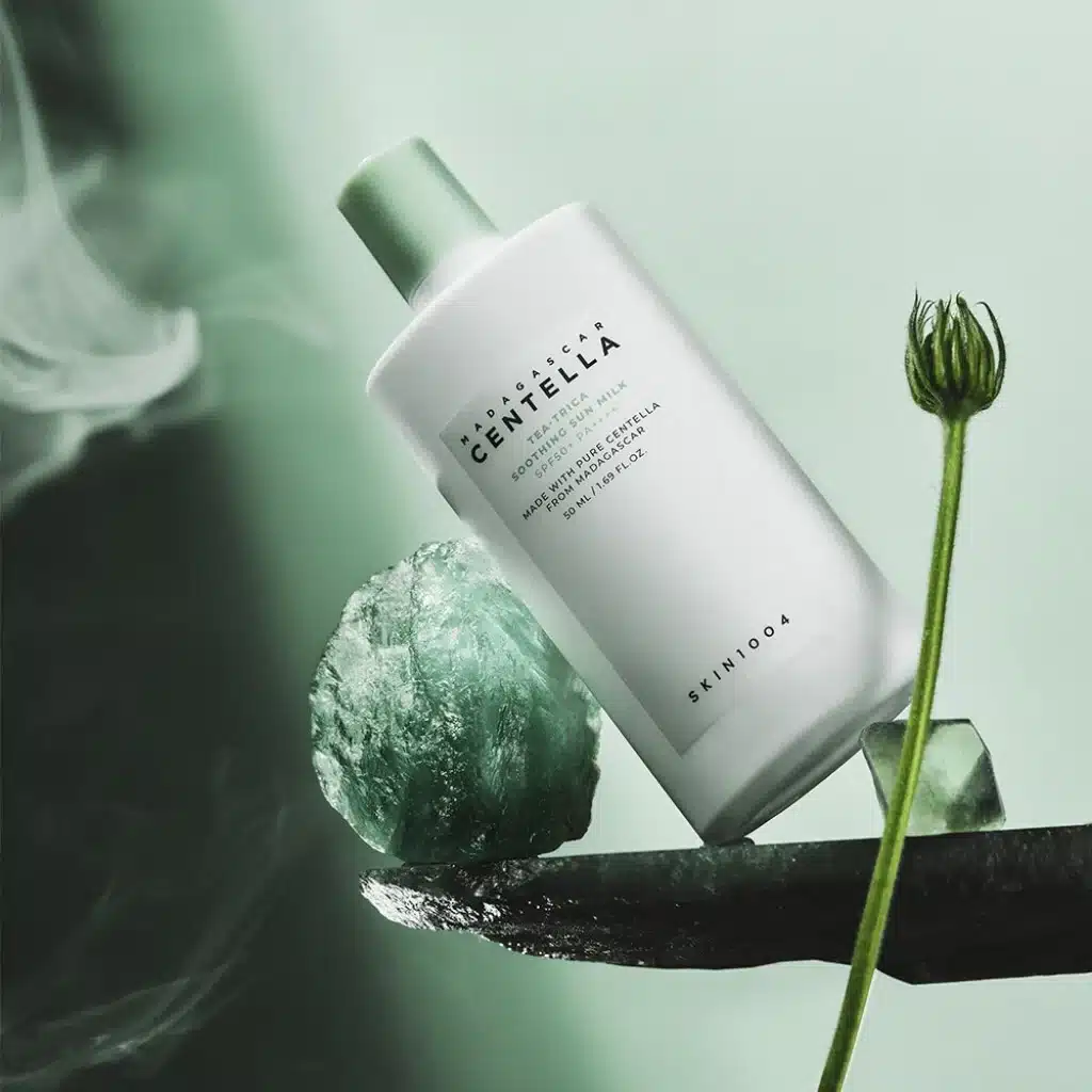 ضد آفتاب چای سبز سنتلا اسکین 1004  SKIN 1004 MADAGASCAR CENTELLA – TEA-TRICA SOOTHING SUN MILK – 50 ml
