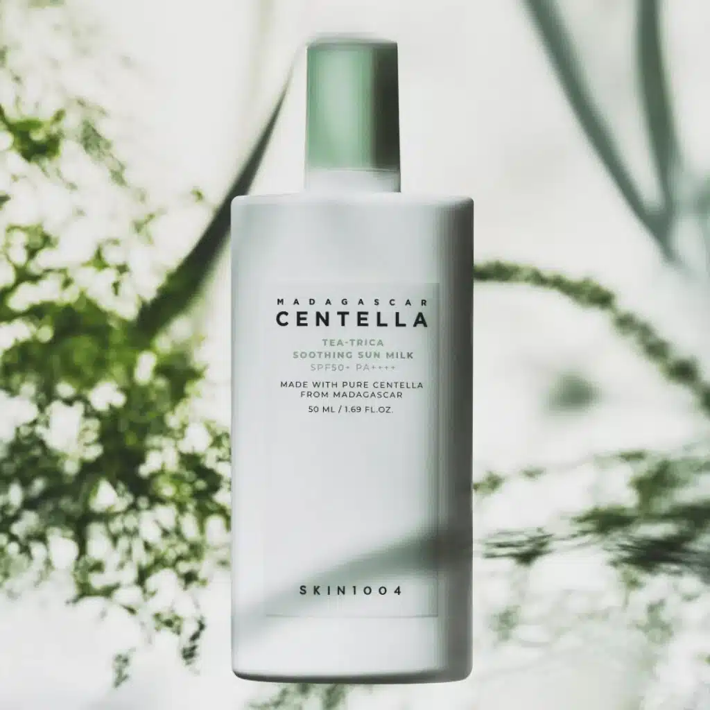 ضد آفتاب چای سبز سنتلا اسکین 1004  SKIN 1004 MADAGASCAR CENTELLA – TEA-TRICA SOOTHING SUN MILK – 50 ml